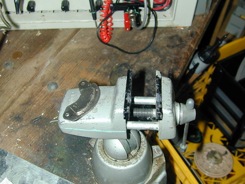 Harddrive magnet epoxied to a bench vise