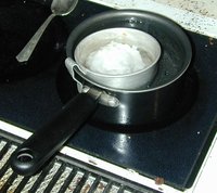 can within a can double boiler, to prevent fire